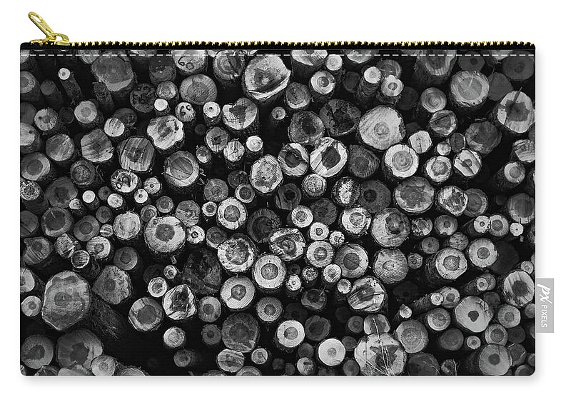 Log Zip Pouch featuring the photograph Log Stack by Ryan Workman Photography