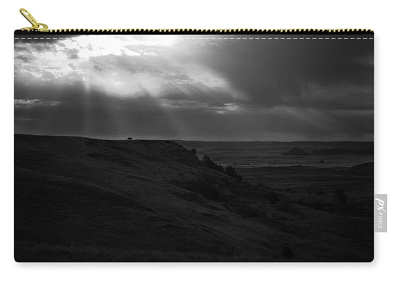 Lone Bison On Dramatic Landscape Zip Pouch featuring the photograph Lone Bison On Dramatic Landscape by Dan Sproul