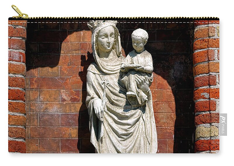 Madonna Zip Pouch featuring the photograph Madonna and Child Sculpture in Bruges by Olivier Le Queinec