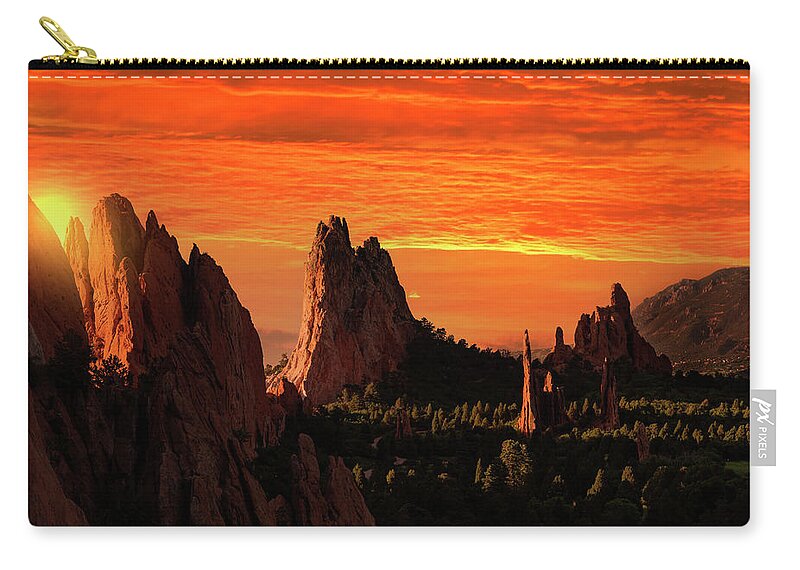 Stunning Sunrise Zip Pouch featuring the photograph Magical Sunrise Over Garden Of Gods Park by Dan Sproul