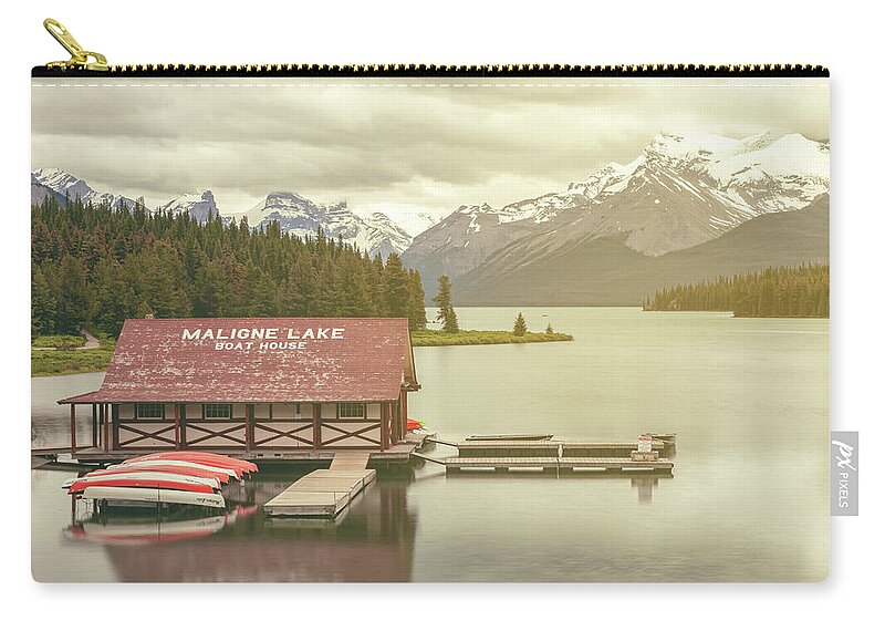 Canadian Rockies Zip Pouch featuring the photograph Maligne Lake Boathouse by Jonathan Nguyen