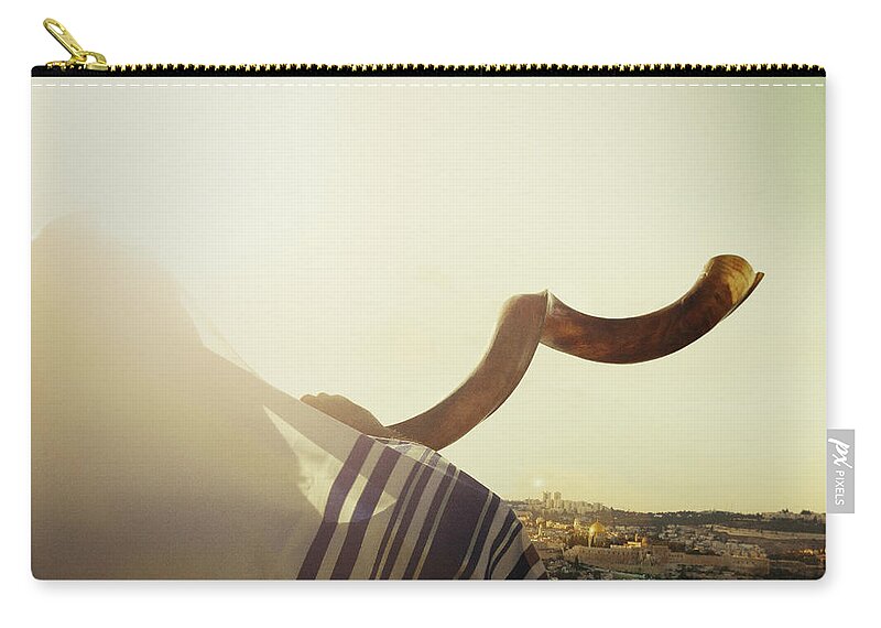 Shofar Zip Pouch featuring the photograph Man blowing Shofar in Jerusalem by Stella Levi