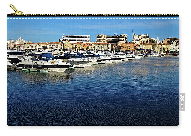 Vilamoura Zip Pouch featuring the photograph Marina of Vilamoura during afternoon by Angelo DeVal