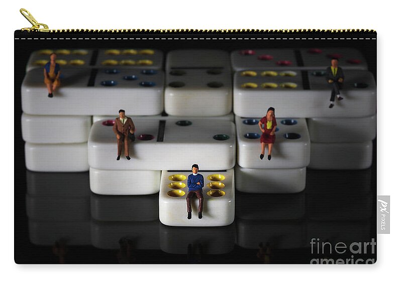 Conceptual Zip Pouch featuring the photograph miniature people on white colored dominoes Black background macro by Pablo Avanzini