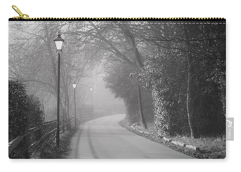 Autumn Zip Pouch featuring the photograph Misty Road to Royden by Spikey Mouse Photography