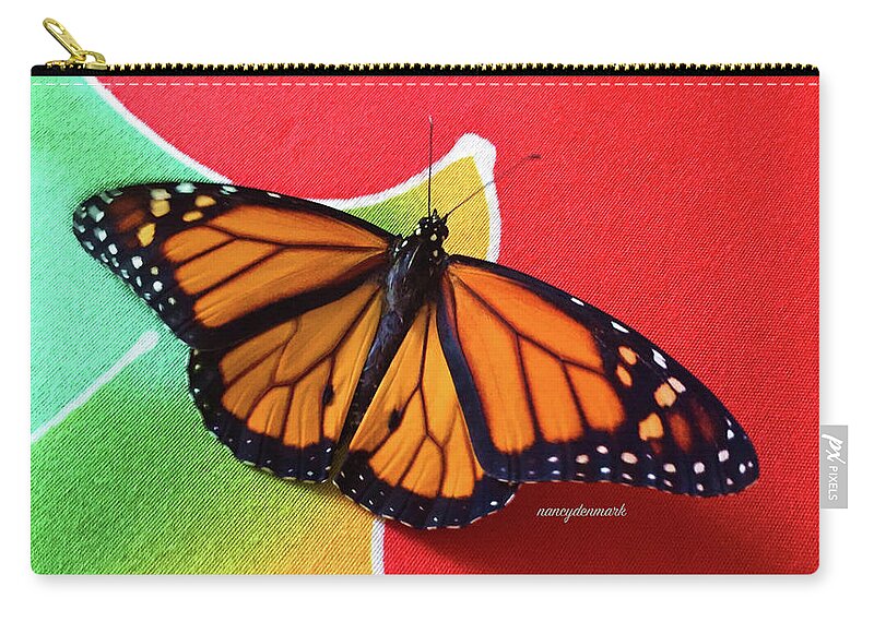 Monarch Zip Pouch featuring the photograph Monarch On Tapestry by Nancy Denmark