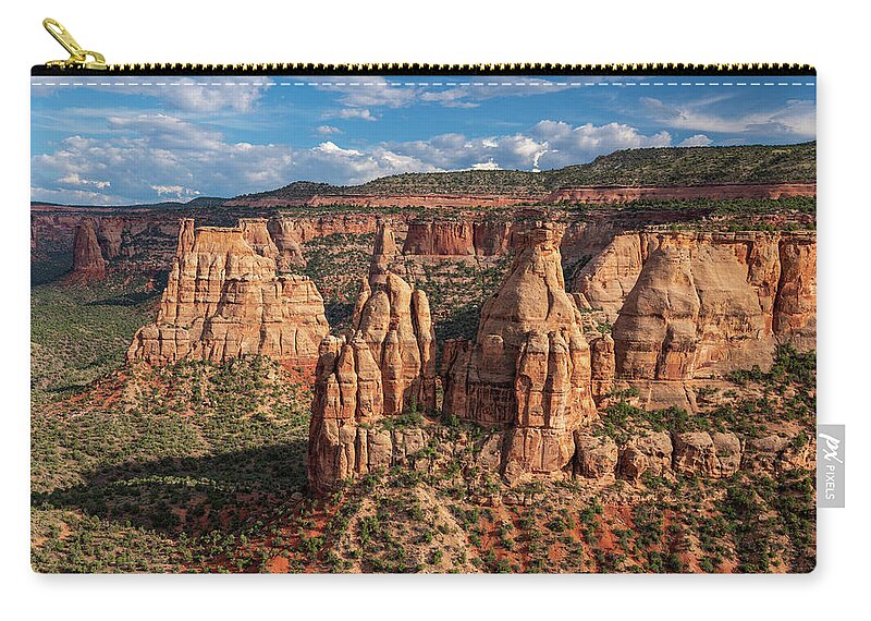 Colorado Zip Pouch featuring the photograph Monument Canyon in Colorado by Kyle Lee