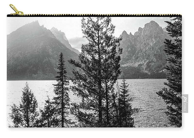 Jenny Lake Black And White Zip Pouch featuring the photograph Moody Monochrome Jenny Lake Grand Tetons by Dan Sproul