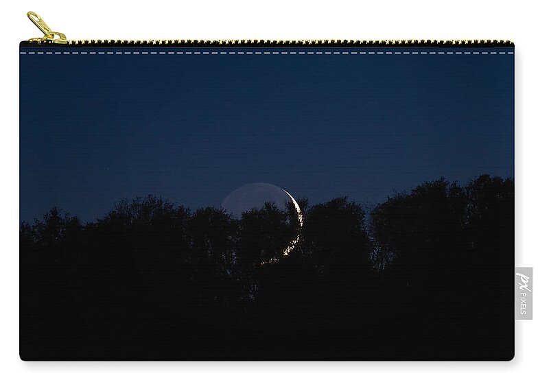 Photography Zip Pouch featuring the photograph Moon in the treetops. by Evan Foster