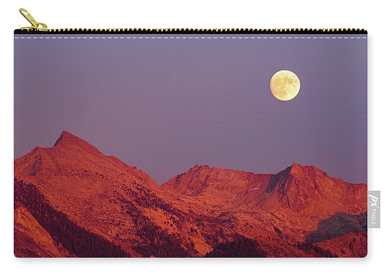 Moon Zip Pouch featuring the photograph Moon Over Alpenglow by Brett Harvey