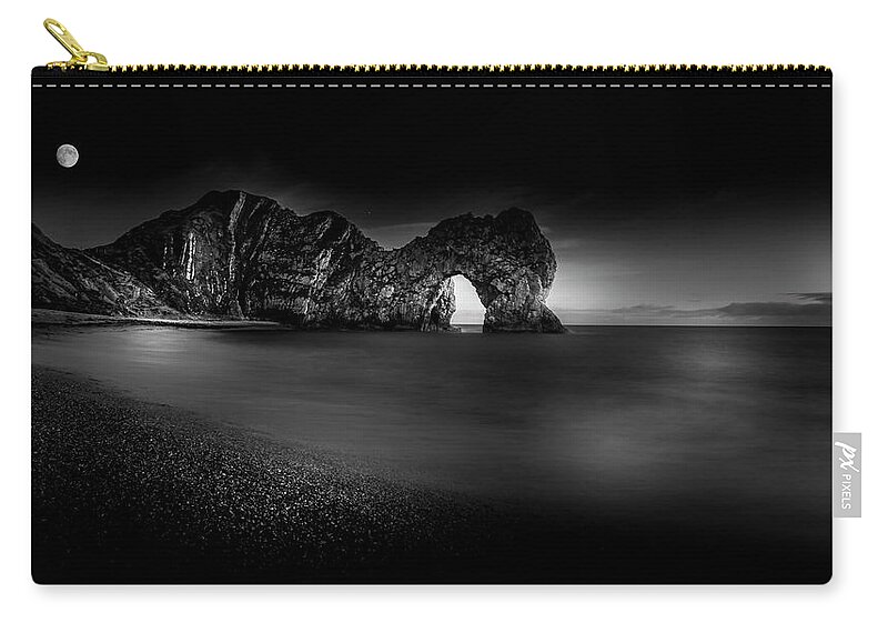 Black Zip Pouch featuring the photograph Moon over Durdle Door by Chris Boulton