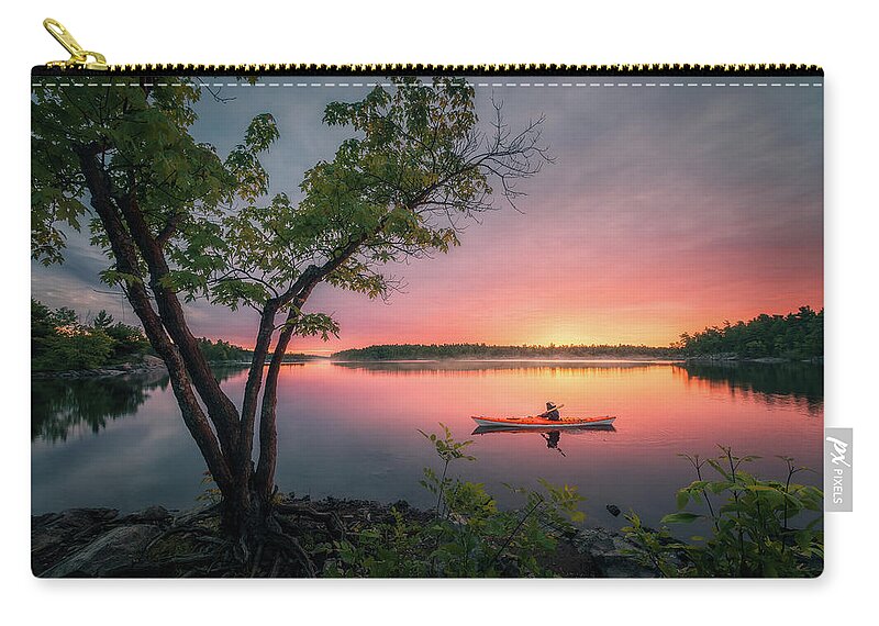 Sunrise Zip Pouch featuring the photograph Morning Paddling at French River #2 by Henry w Liu