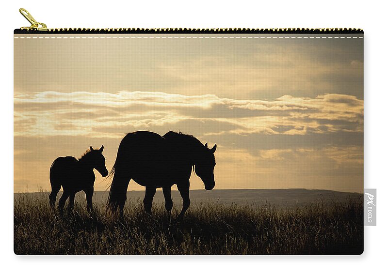 Horses Zip Pouch featuring the photograph Mother Horse and Foal in sunset by Naomi Maya