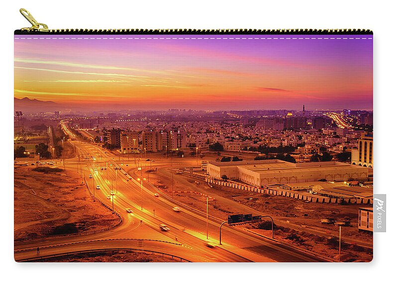 Middle East Zip Pouch featuring the photograph Muscat at sunset by Alexey Stiop