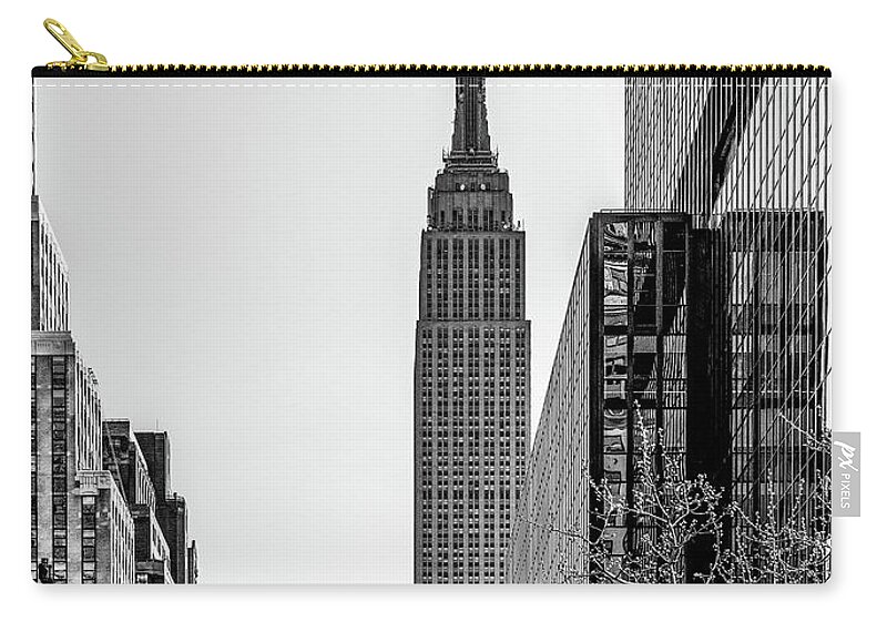 New York City Zip Pouch featuring the photograph New York's Iconic Empire State Building, Black and White by Marcy Wielfaert
