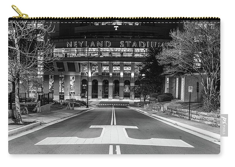University Of Tennessee At Night Zip Pouch featuring the photograph Neyland Stadium at the University of Tennessee at night in black and white by Eldon McGraw