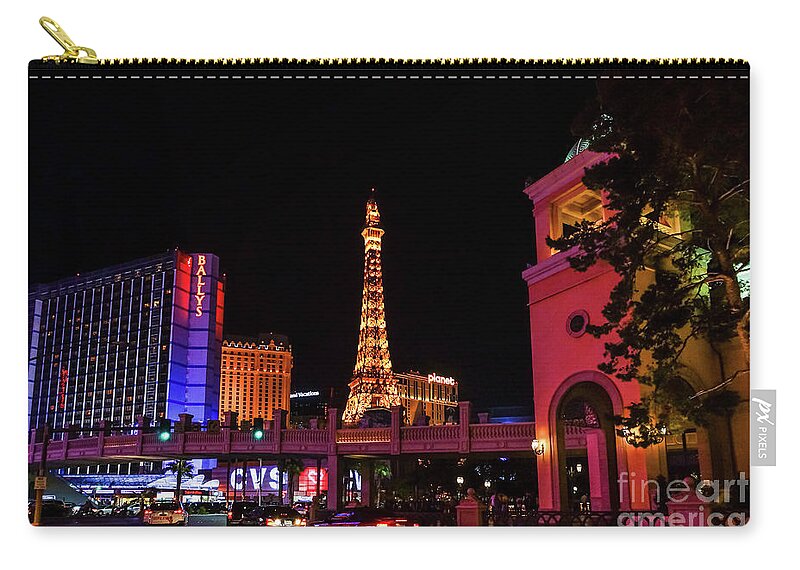 Las Vegas Zip Pouch featuring the photograph Night In Vegas by Jennifer White