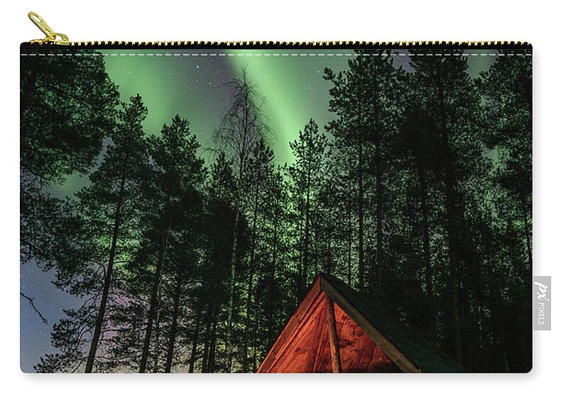Aurora Borealis Zip Pouch featuring the photograph Northern lights above a fire place by Thomas Kast