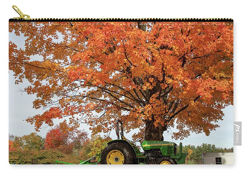 Autumn Foliage Massachusetts Zip Pouch featuring the photograph Tractor under Orange Maple Tree by Jeff Folger