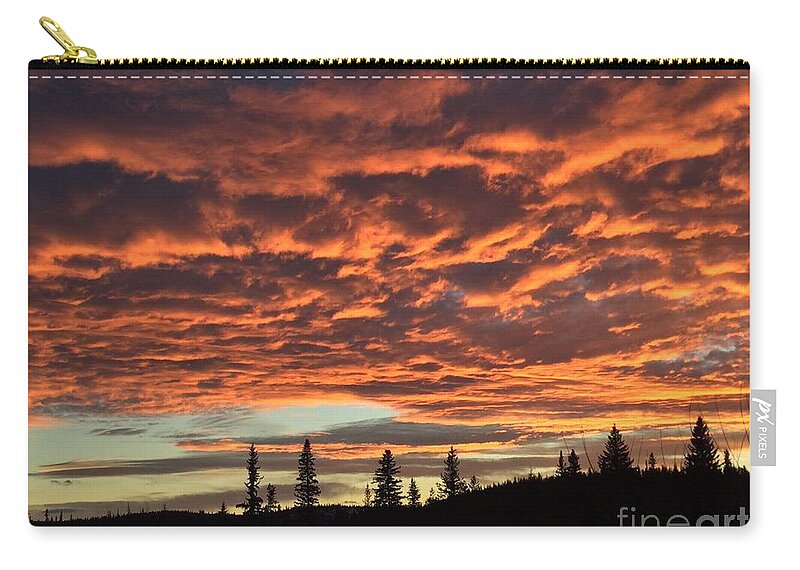 Chilcotin Plateau Zip Pouch featuring the photograph November Sunset by Nicola Finch