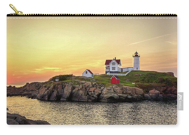 Nubble Lighthouse Zip Pouch featuring the photograph Nubble Lighthouse Sunrise by Deb Bryce