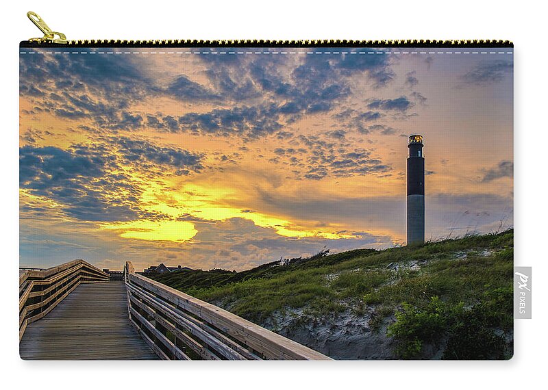 Oak Island Zip Pouch featuring the photograph Oak Island Lighthouse Sunset by Nick Noble
