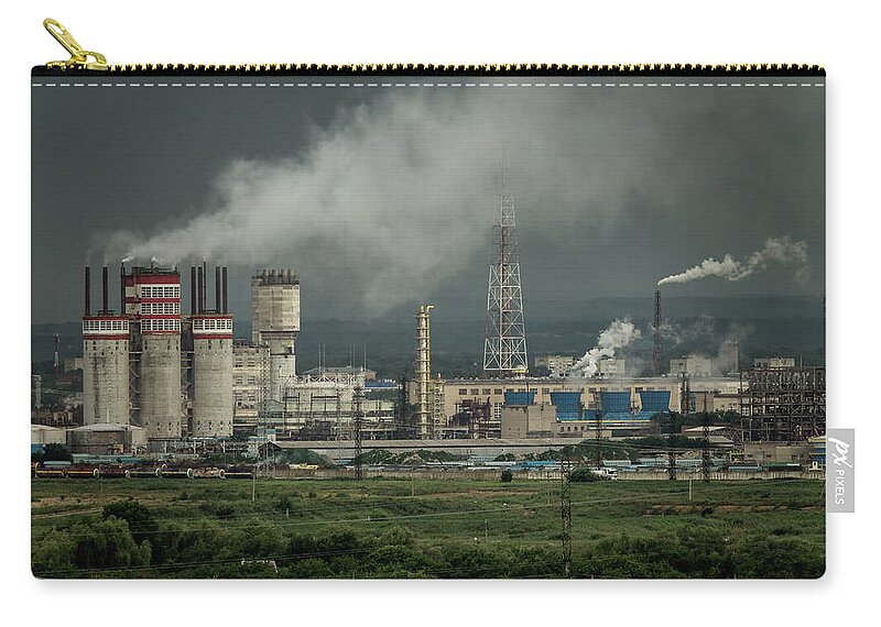 Petrochemical Zip Pouch featuring the photograph Oil and gas refinery plant by Mikhail Kokhanchikov