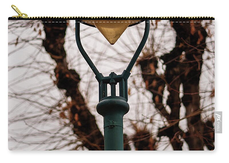 Lantern Zip Pouch featuring the photograph Old rusty lantern and gloomy sky by Mendelex Photography