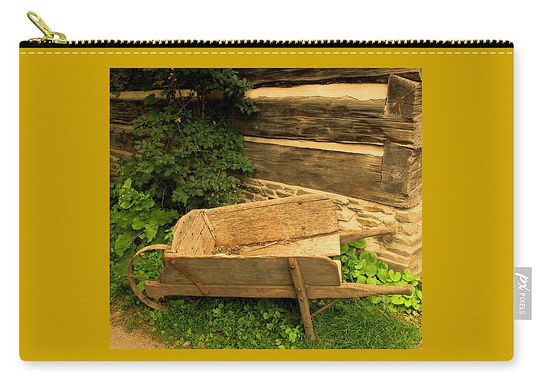 Antique Zip Pouch featuring the photograph Old Wheelbarrow by Ian MacDonald