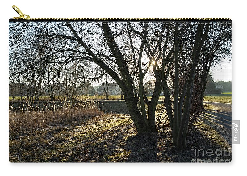 Tree Zip Pouch featuring the photograph On the way through the sleeping nature 2 by Adriana Mueller