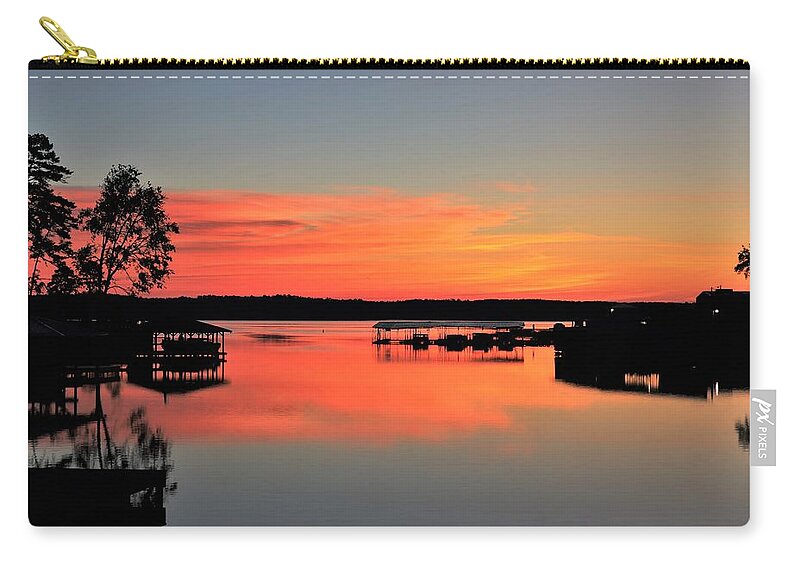 Morning Zip Pouch featuring the photograph Orange Lava Lake Cove Morning by Ed Williams