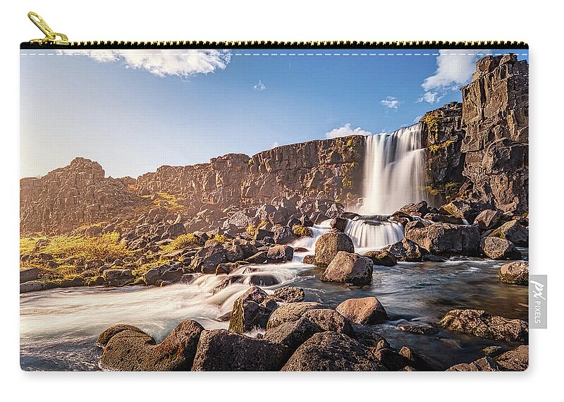 Oxararfoss Zip Pouch featuring the photograph Oxararfoss Waterfall in Iceland by Alexios Ntounas