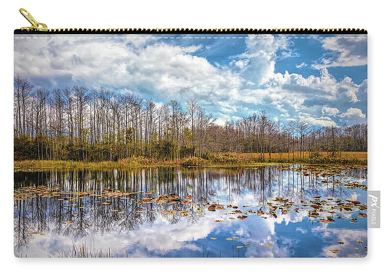 Clouds Zip Pouch featuring the photograph Peaceful Autumn Reflections on the Everglades by Debra and Dave Vanderlaan