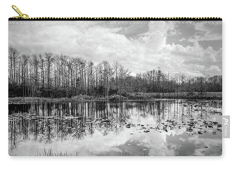 Clouds Zip Pouch featuring the photograph Peaceful Reflections on the Everglades in Black and White by Debra and Dave Vanderlaan