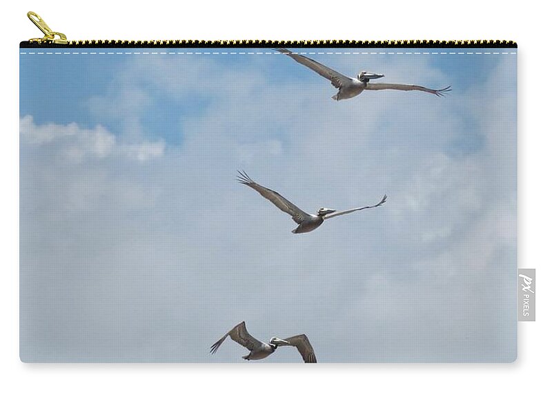 Pelicans Zip Pouch featuring the photograph Pelican Fly By by Diana Rajala