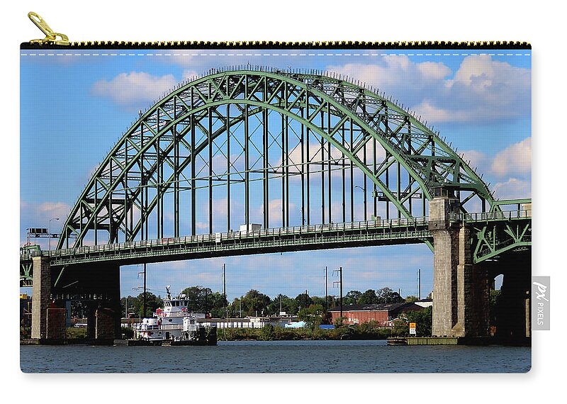 Tugboat Zip Pouch featuring the photograph Penrose Tug Floating Below the Tacony-Palmyra Bridge on the Delaware River by Linda Stern