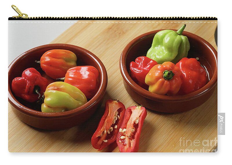 Food Zip Pouch featuring the photograph Peppers by Stephen Melia