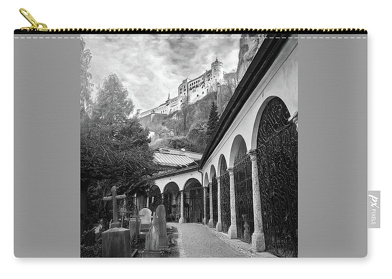 Salzburg Carry-all Pouch featuring the photograph Petersfriedhof and Salzburg Castle Black and White by Carol Japp