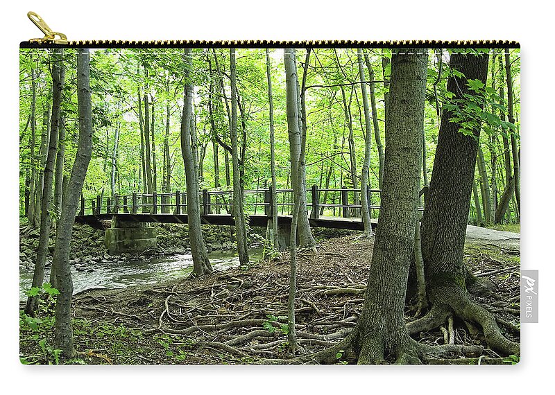 Spring Zip Pouch featuring the photograph Petrifying Springs Bridge I by Scott Olsen