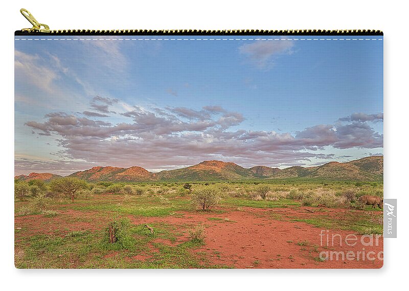 Lake Zip Pouch featuring the photograph Pilanesberg Sunset with Rhino by Brian Kamprath