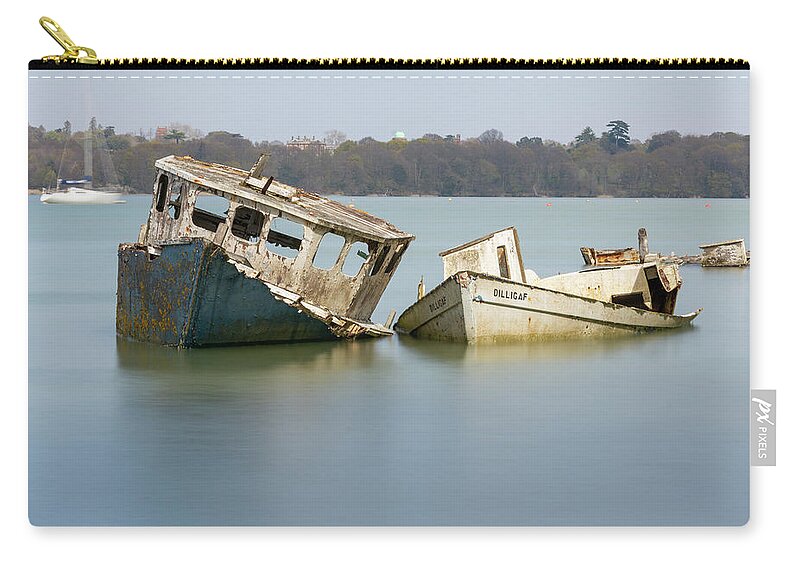 Pin Mill Zip Pouch featuring the photograph Pin Mill wrecks long exposure 4 by Steev Stamford