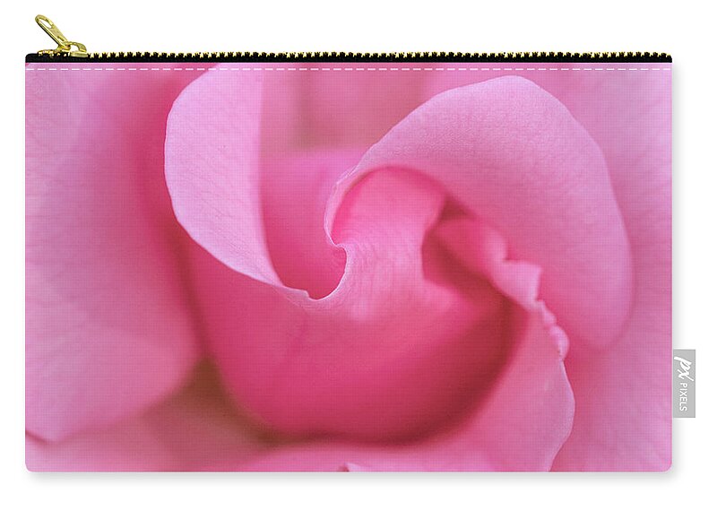 Pink Zip Pouch featuring the photograph Pink rose macro by Gareth Parkes