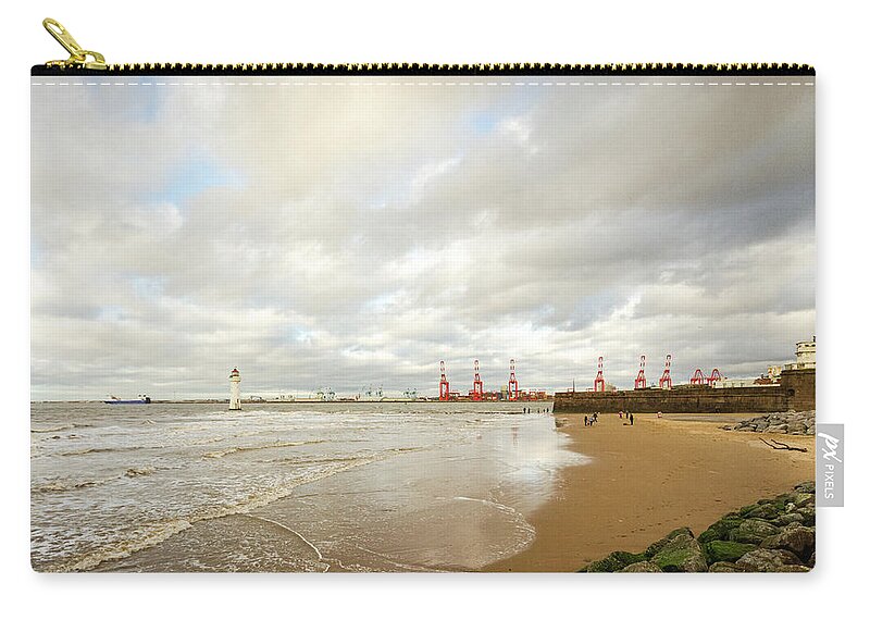 Beach Zip Pouch featuring the photograph Playing in the Tide by Spikey Mouse Photography