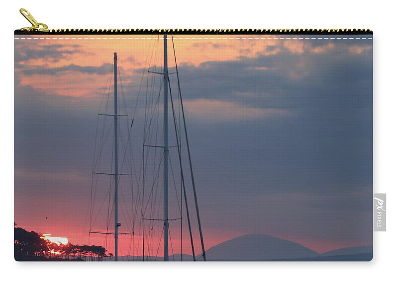 Sailboat Zip Pouch featuring the photograph Punta Bay at Sunset by Robert McKinstry