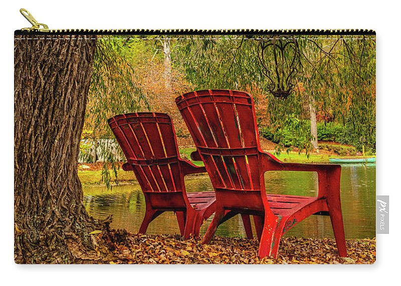 Carolina Zip Pouch featuring the photograph Red Chairs at the Pond by Debra and Dave Vanderlaan