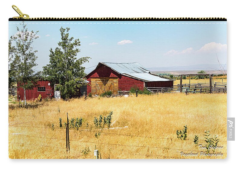Red Home On The Range Zip Pouch featuring the photograph Red Home on the Range by Tom Cochran