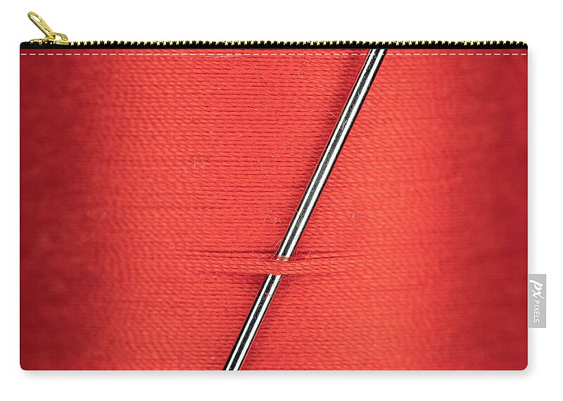 Clothes Zip Pouch featuring the photograph Red Needle and Thread Close Up by Amelia Pearn