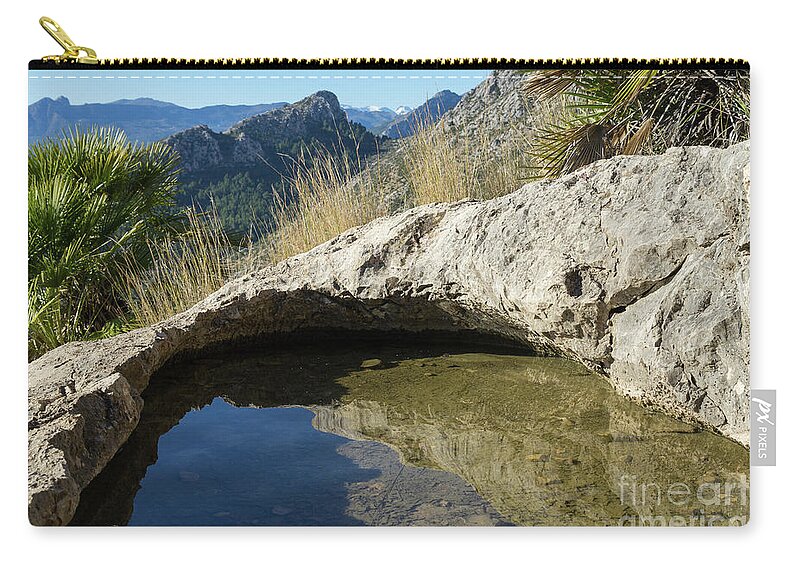 Water Carry-all Pouch featuring the photograph Water hole in the mountains by Adriana Mueller