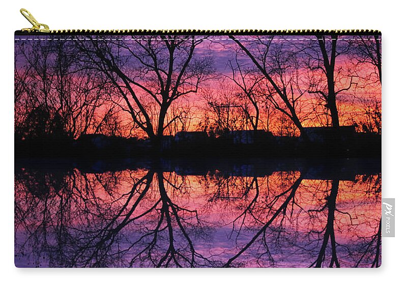 Trees Zip Pouch featuring the photograph Reflections of a Winter Sunset by Karen Adams