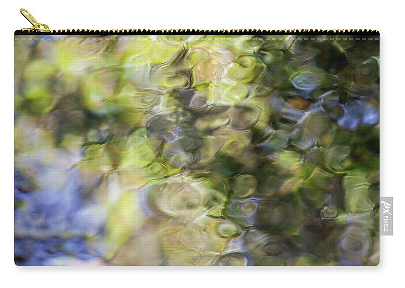 Reflective Abstract Water Zip Pouch featuring the photograph Reflective abstract water by Donald Kinney